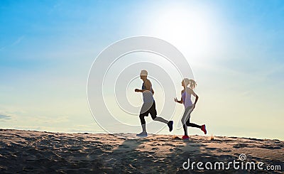 Fitness sport couple running jogging outside Stock Photo