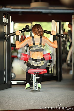 Fitness, sport, powerlifting people concept sporty woman exercising barbell Stock Photo