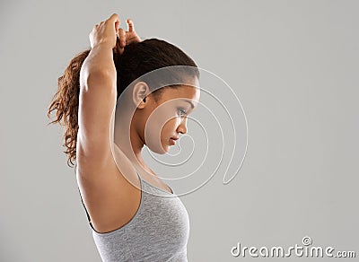 Fitness, tie hair or profile of woman on grey background for wellness or sports. Model, ponytail or person with Stock Photo