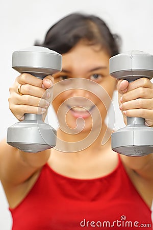 Fitness woman lifting weights Stock Photo