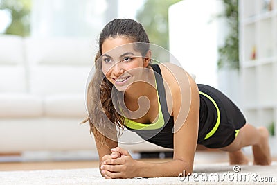 Fitness woman practicing sport at home Stock Photo