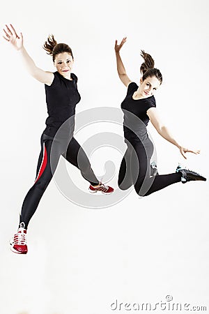 Fitness women jumping Stock Photo