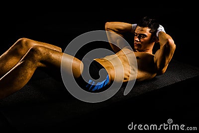 Fitness young man working abs Stock Photo