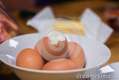 Five boiled eggs in a white plate Stock Photo