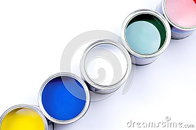 Five cans of multicolored paint on a white background Stock Photo