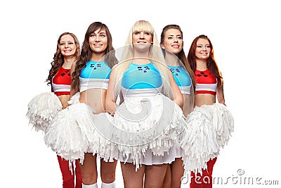 Group of young female cheerleaders team are standing with pom-pom`s on background Stock Photo