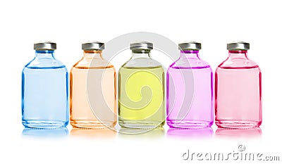 Five colored bottles with essential oils Stock Photo