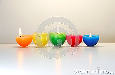 Five colored burning candle Stock Photo