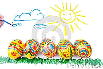 Five easter eggs on grass, sun in sky Stock Photo