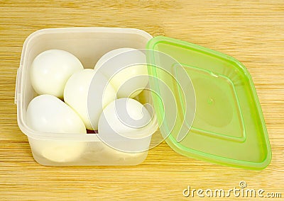 Five eggs plastic container Stock Photo