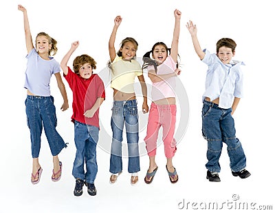 Five friends jumping and smiling Stock Photo