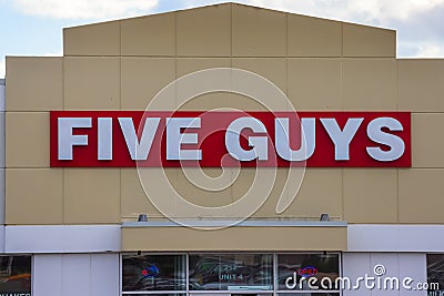 FIVE GUYS Restaurant banner. Five Guys Burgers Fries, HALIFAX, NOVA SCOTIA, CANADA Editorial Stock Photo