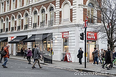 The Five Guys restaurant on Long Acre in Covent Garden, London Editorial Stock Photo