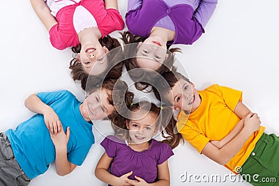 Five happy kids on the floor Stock Photo