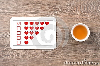 Five hearts rating in digital tablet Stock Photo