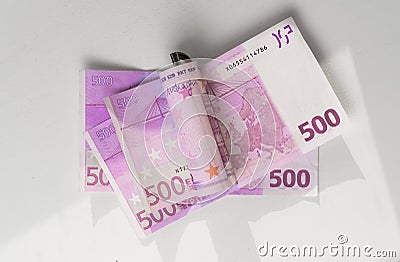 Five hundred Euro bill in wave shape with money clip Stock Photo