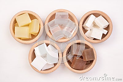 Five kinds of glycerin soap bases in wooden bowls Stock Photo