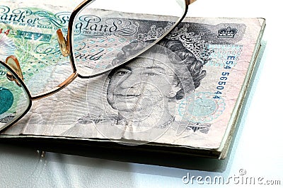 Five pounds and glasses Editorial Stock Photo