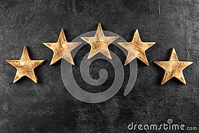 Five stars on dark background Stock Photo