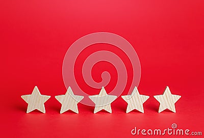 Five stars on a red background. Rating evaluation concept. Service quality feedback. High satisfaction. Good reputation Stock Photo