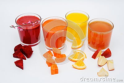 Five tall glasses with juice of carrot, cucumber, tomato, beetroot and pumpkin, vegetables isolated on white background Stock Photo