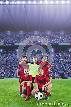 Five teenage soccer players on a soccer field Stock Photo