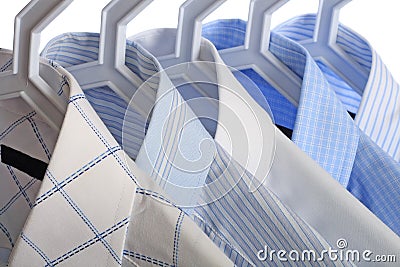 Five white-and-blue shirts Stock Photo