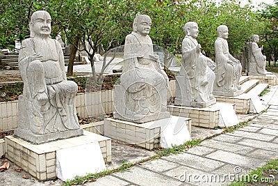 Five white marble Buddha statues in a garden, China Stock Photo