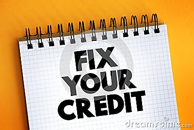 Fix Your Credit text on notepad, concept background Stock Photo