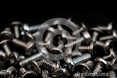 Fixing bolts. Assembly of computers. Technical texture. Stock Photo