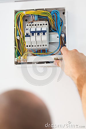 Fixing Electric Fuse at Home Stock Photo