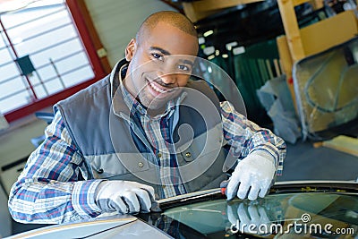 he fixing glass Stock Photo