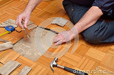 Fixing Parquet in the Apartment Stock Photo