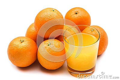 Fizzy orange juice from effervescent tablet with oranges at backdrop Stock Photo