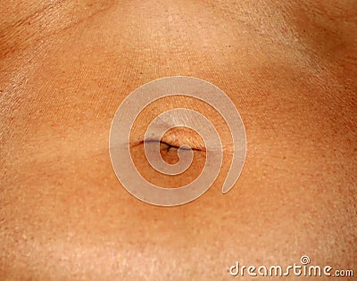 Flabby wrinkled abdomen. The navel is stretched. Stock Photo