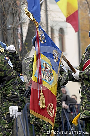 The Romanian flag in front of Calugareni battalion Editorial Stock Photo