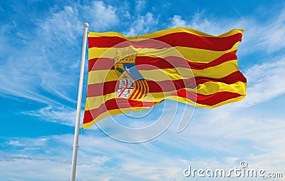 flag of Aragon , Spain at cloudy sky background on sunset, panoramic view. Spanish travel and patriot concept. copy space for wide Cartoon Illustration