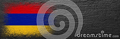 Flag of Armenia. Flag is painted on black slate stone. Stone background. Copy space. Textured background Stock Photo