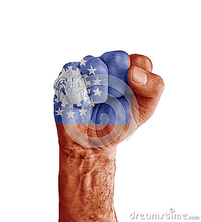 Flag of Burma painted on human fist like victory symbol Stock Photo