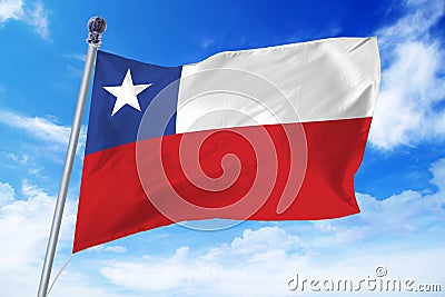 Flag of Chile developing against a clear blue sky Stock Photo