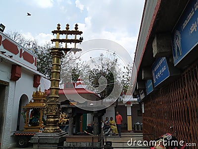 Flag column or Dhwaja Stambha in front of the Sri Kaadu Malleshwara/Mallikarjuna Swamy Temple. Hindu temple dedicated to the Shiva Editorial Stock Photo
