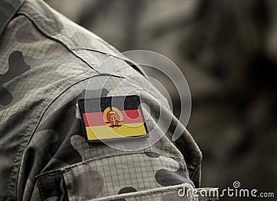 Flag of East Germany on military uniform. German Democratic Republic DDR. Collage Stock Photo