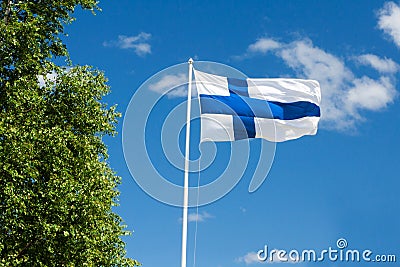 Flag of Finland on sky background. Stock Photo