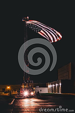 The flag flying under the truck Stock Photo