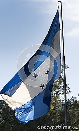 Flag Honduras movement to the wind, Central America. Embassy in Guatemala Stock Photo