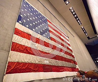 Flag inside National September 11 Memorial & Museum. Editorial Stock Photo