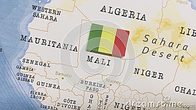 The Flag of Mali in the World Map Stock Photo