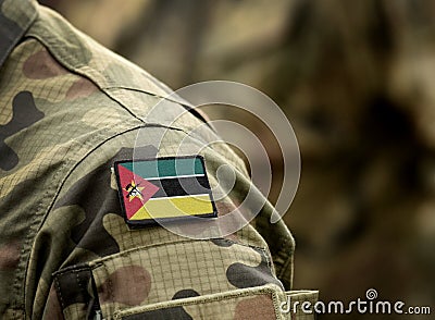 Flag of Mozambique on military uniform. Army, troops, soldiers. Collage Stock Photo