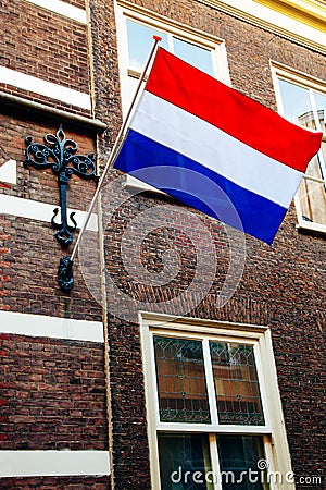 Crown sky holiday house wall flag Netherlands building King`s Day Holland dutch celebration april Stock Photo