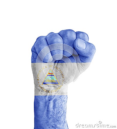 Flag of Nicaragua painted on human fist like victory symbol Stock Photo
